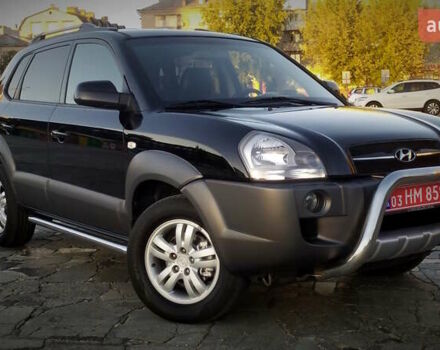 Черный Хендай Туксон, объемом двигателя 2 л и пробегом 230 тыс. км за 8600 $, фото 27 на Automoto.ua