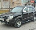Черный Хендай Туксон, объемом двигателя 2 л и пробегом 270 тыс. км за 6800 $, фото 1 на Automoto.ua