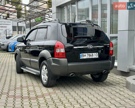 Чорний Хендай Туксон, об'ємом двигуна 2.66 л та пробігом 145 тис. км за 8900 $, фото 2 на Automoto.ua