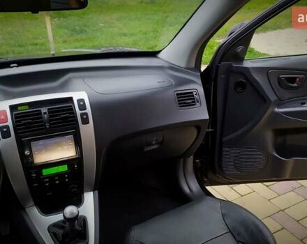 Чорний Хендай Туксон, об'ємом двигуна 2 л та пробігом 229 тис. км за 8600 $, фото 114 на Automoto.ua