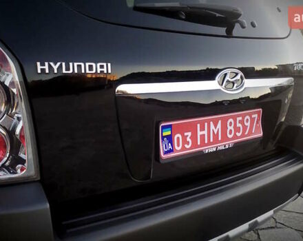 Черный Хендай Туксон, объемом двигателя 2 л и пробегом 230 тыс. км за 8600 $, фото 74 на Automoto.ua