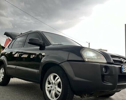 Черный Хендай Туксон, объемом двигателя 2.7 л и пробегом 266 тыс. км за 7700 $, фото 4 на Automoto.ua