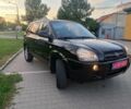Черный Хендай Туксон, объемом двигателя 2 л и пробегом 192 тыс. км за 7950 $, фото 1 на Automoto.ua