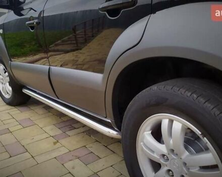 Чорний Хендай Туксон, об'ємом двигуна 2 л та пробігом 229 тис. км за 8600 $, фото 83 на Automoto.ua