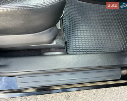 Черный Хендай Туксон, объемом двигателя 2 л и пробегом 256 тыс. км за 7800 $, фото 14 на Automoto.ua