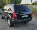 Черный Хендай Туксон, объемом двигателя 2 л и пробегом 218 тыс. км за 8600 $, фото 29 на Automoto.ua