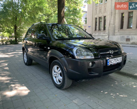 Черный Хендай Туксон, объемом двигателя 1.98 л и пробегом 232 тыс. км за 9100 $, фото 3 на Automoto.ua