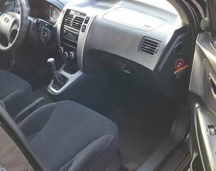 Черный Хендай Туксон, объемом двигателя 2 л и пробегом 190 тыс. км за 8150 $, фото 28 на Automoto.ua