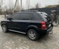 Чорний Хендай Туксон, об'ємом двигуна 1.99 л та пробігом 345 тис. км за 7600 $, фото 1 на Automoto.ua