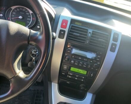 Черный Хендай Туксон, объемом двигателя 2 л и пробегом 227 тыс. км за 7300 $, фото 5 на Automoto.ua