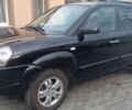 Чорний Хендай Туксон, об'ємом двигуна 1.98 л та пробігом 190 тис. км за 7999 $, фото 1 на Automoto.ua