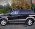 Черный Хендай Туксон, объемом двигателя 2 л и пробегом 230 тыс. км за 8600 $, фото 100 на Automoto.ua