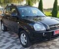 Черный Хендай Туксон, объемом двигателя 2 л и пробегом 190 тыс. км за 8300 $, фото 1 на Automoto.ua