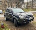 Чорний Хендай Туксон, об'ємом двигуна 2 л та пробігом 232 тис. км за 8400 $, фото 1 на Automoto.ua