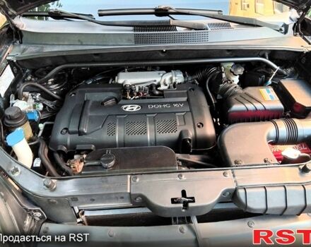 Черный Хендай Туксон, объемом двигателя 2 л и пробегом 270 тыс. км за 7400 $, фото 9 на Automoto.ua