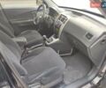 Черный Хендай Туксон, объемом двигателя 2 л и пробегом 270 тыс. км за 6800 $, фото 19 на Automoto.ua