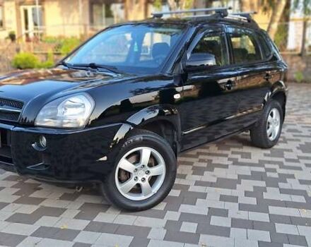 Черный Хендай Туксон, объемом двигателя 2 л и пробегом 190 тыс. км за 8150 $, фото 18 на Automoto.ua