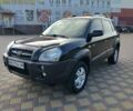 Черный Хендай Туксон, объемом двигателя 2 л и пробегом 240 тыс. км за 7900 $, фото 3 на Automoto.ua