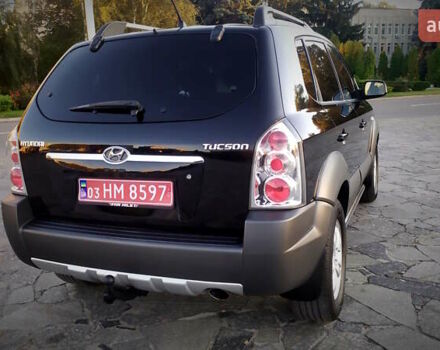 Черный Хендай Туксон, объемом двигателя 2 л и пробегом 230 тыс. км за 8600 $, фото 41 на Automoto.ua