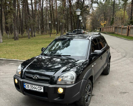 Черный Хендай Туксон, объемом двигателя 1.99 л и пробегом 266 тыс. км за 7500 $, фото 2 на Automoto.ua