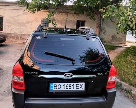 Черный Хендай Туксон, объемом двигателя 2 л и пробегом 270 тыс. км за 7400 $, фото 3 на Automoto.ua