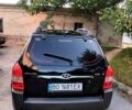 Черный Хендай Туксон, объемом двигателя 2 л и пробегом 270 тыс. км за 7400 $, фото 3 на Automoto.ua