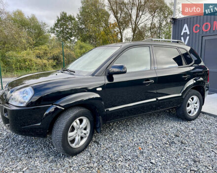 Черный Хендай Туксон, объемом двигателя 2 л и пробегом 224 тыс. км за 7750 $, фото 2 на Automoto.ua