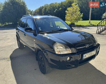 Черный Хендай Туксон, объемом двигателя 2 л и пробегом 189 тыс. км за 8250 $, фото 1 на Automoto.ua