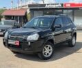 Черный Хендай Туксон, объемом двигателя 2 л и пробегом 259 тыс. км за 9290 $, фото 1 на Automoto.ua