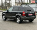 Чорний Хендай Туксон, об'ємом двигуна 2 л та пробігом 230 тис. км за 6850 $, фото 6 на Automoto.ua
