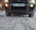 Черный Хендай Туксон, объемом двигателя 1.98 л и пробегом 335 тыс. км за 7800 $, фото 1 на Automoto.ua