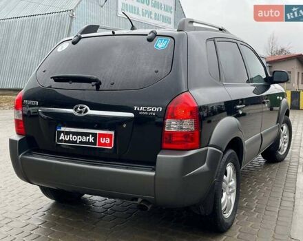 Черный Хендай Туксон, объемом двигателя 2 л и пробегом 163 тыс. км за 7690 $, фото 6 на Automoto.ua