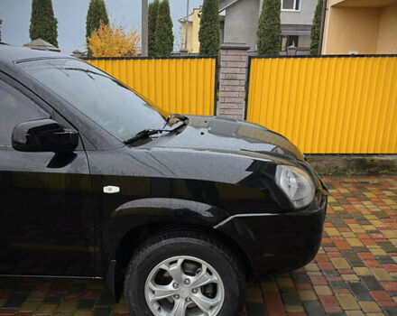 Черный Хендай Туксон, объемом двигателя 2 л и пробегом 151 тыс. км за 9100 $, фото 4 на Automoto.ua