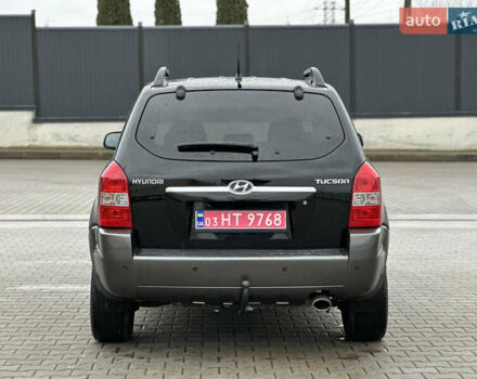 Чорний Хендай Туксон, об'ємом двигуна 2 л та пробігом 230 тис. км за 6850 $, фото 7 на Automoto.ua