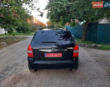 Черный Хендай Туксон, объемом двигателя 2 л и пробегом 219 тыс. км за 7990 $, фото 35 на Automoto.ua