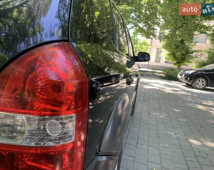 Черный Хендай Туксон, объемом двигателя 1.98 л и пробегом 232 тыс. км за 9100 $, фото 23 на Automoto.ua