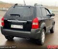 Чорний Хендай Туксон, об'ємом двигуна 2 л та пробігом 154 тис. км за 7400 $, фото 7 на Automoto.ua