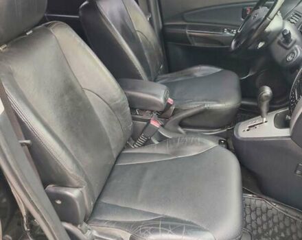 Черный Хендай Туксон, объемом двигателя 2.7 л и пробегом 280 тыс. км за 7200 $, фото 16 на Automoto.ua