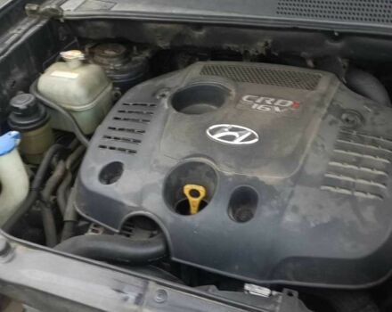 Черный Хендай Туксон, объемом двигателя 2 л и пробегом 200 тыс. км за 8300 $, фото 12 на Automoto.ua