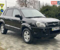 Черный Хендай Туксон, объемом двигателя 2 л и пробегом 180 тыс. км за 7700 $, фото 8 на Automoto.ua