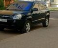 Чорний Хендай Туксон, об'ємом двигуна 2 л та пробігом 230 тис. км за 6900 $, фото 1 на Automoto.ua