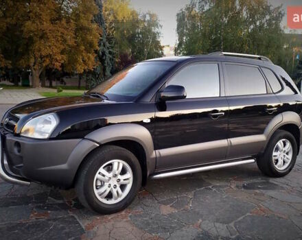 Черный Хендай Туксон, объемом двигателя 2 л и пробегом 230 тыс. км за 8600 $, фото 97 на Automoto.ua