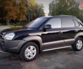 Черный Хендай Туксон, объемом двигателя 2 л и пробегом 230 тыс. км за 8600 $, фото 97 на Automoto.ua