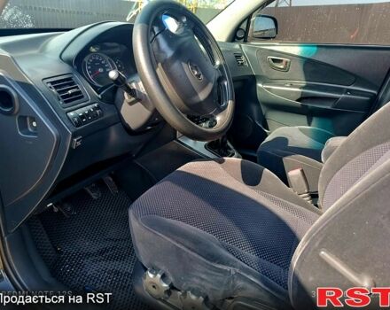 Чорний Хендай Туксон, об'ємом двигуна 2 л та пробігом 154 тис. км за 7400 $, фото 9 на Automoto.ua