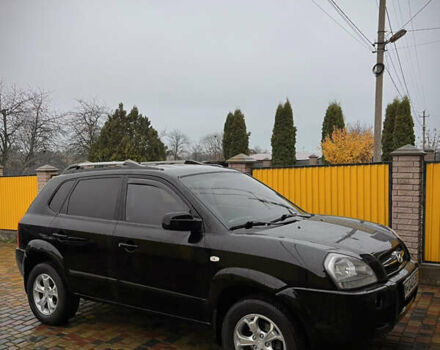 Черный Хендай Туксон, объемом двигателя 2 л и пробегом 151 тыс. км за 9100 $, фото 5 на Automoto.ua