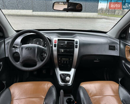 Чорний Хендай Туксон, об'ємом двигуна 2 л та пробігом 230 тис. км за 6850 $, фото 15 на Automoto.ua