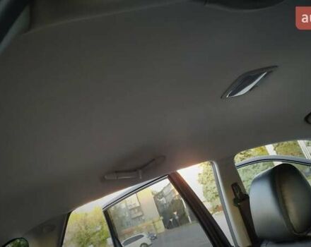 Черный Хендай Туксон, объемом двигателя 2 л и пробегом 230 тыс. км за 8600 $, фото 186 на Automoto.ua