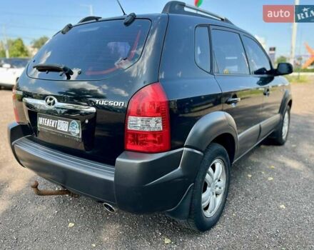 Черный Хендай Туксон, объемом двигателя 2 л и пробегом 227 тыс. км за 8200 $, фото 30 на Automoto.ua