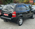 Чорний Хендай Туксон, об'ємом двигуна 2 л та пробігом 180 тис. км за 7999 $, фото 4 на Automoto.ua