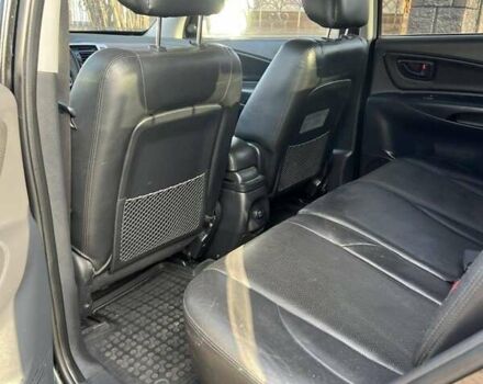 Черный Хендай Туксон, объемом двигателя 1.99 л и пробегом 302 тыс. км за 6900 $, фото 10 на Automoto.ua